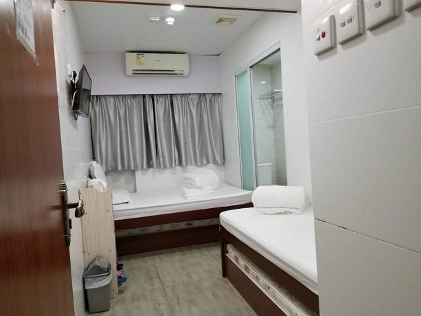 Imagen de la habitación del Hotel Min Hing house. Foto 10