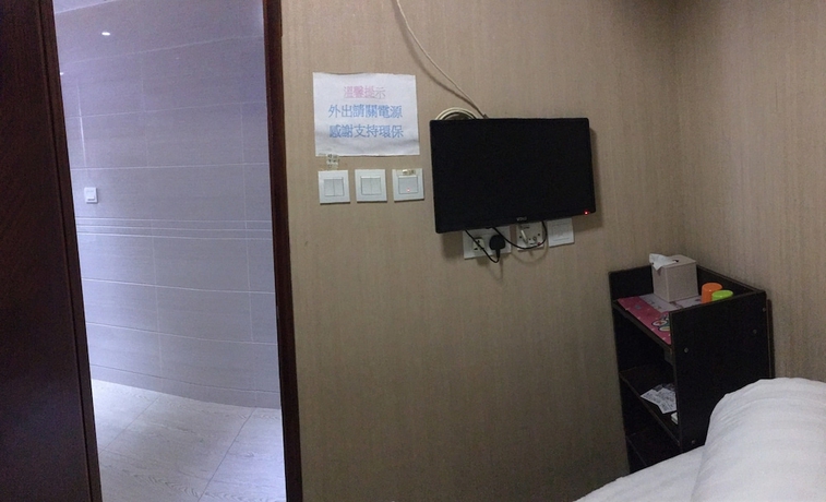 Imagen de la habitación del Hotel Min Hing house. Foto 13
