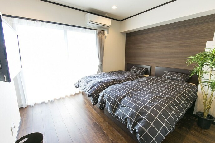 Imagen de la habitación del Hotel Mina Aoi Apartment. Foto 20