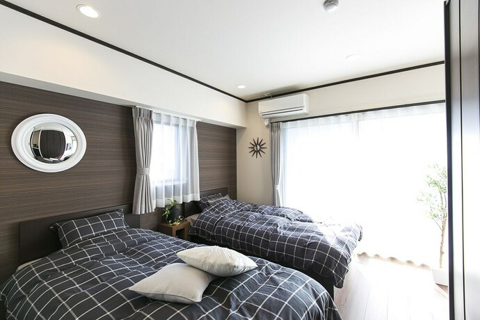 Imagen de la habitación del Hotel Mina Aoi Apartment. Foto 24