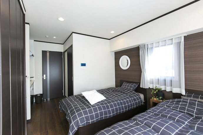 Imagen de la habitación del Hotel Mina Aoi Apartment. Foto 30