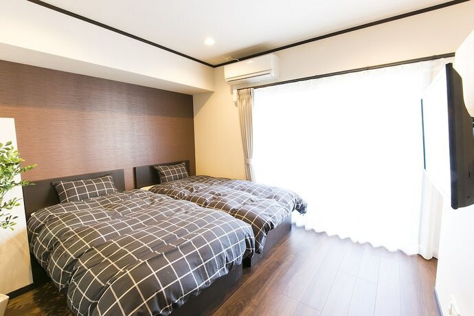 Imagen de la habitación del Hotel Mina Aoi Apartment. Foto 32