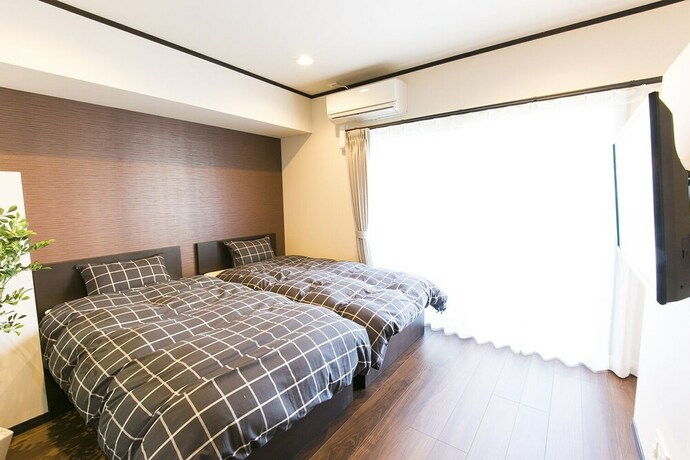 Imagen de la habitación del Hotel Mina Aoi Apartment. Foto 33