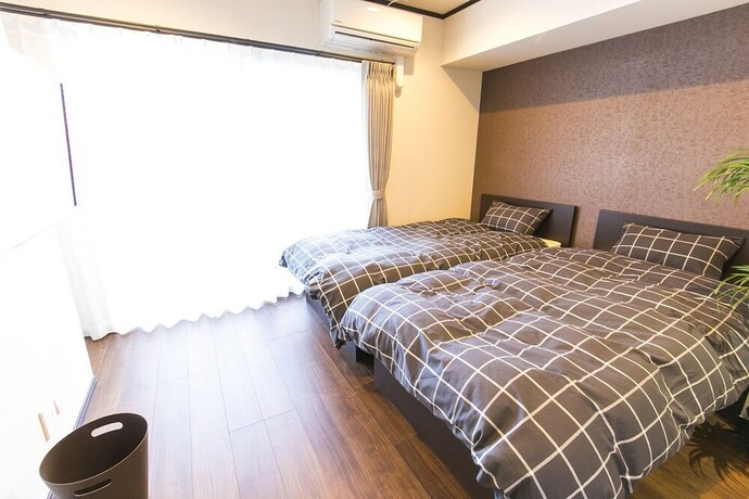 Imagen de la habitación del Hotel Mina Aoi Apartment. Foto 35