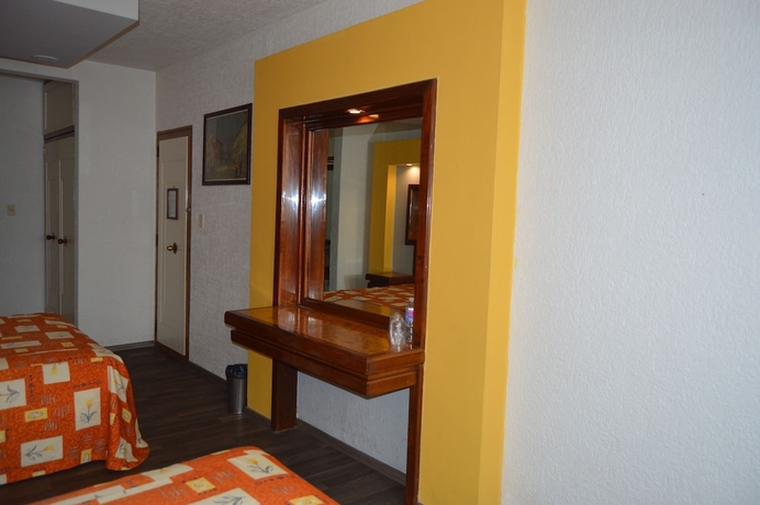 Imagen de la habitación del Hotel Mina. Foto 15