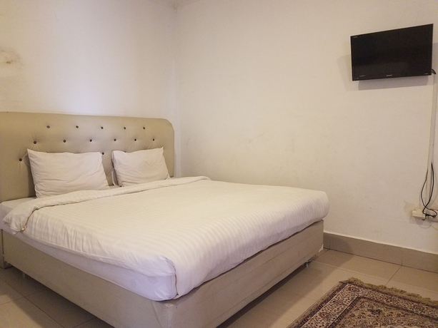 Imagen de la habitación del Hotel Mina Homestay Syariah. Foto 2
