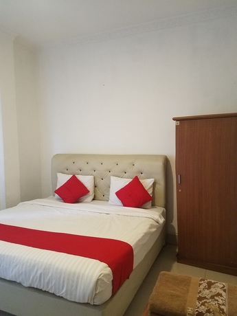 Imagen de la habitación del Hotel Mina Homestay Syariah. Foto 4