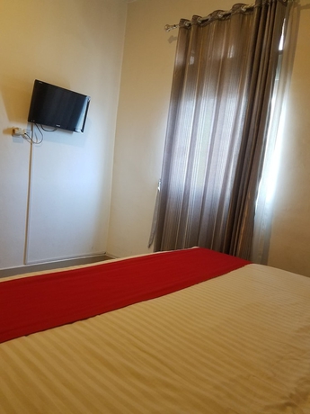 Imagen de la habitación del Hotel Mina Homestay Syariah. Foto 6