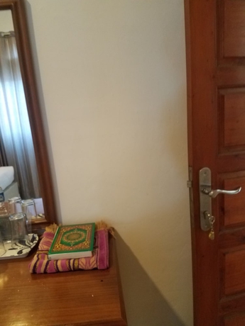 Imagen de la habitación del Hotel Mina Homestay Syariah. Foto 8