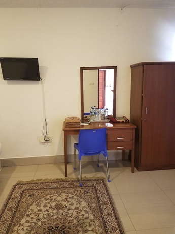 Imagen de la habitación del Hotel Mina Homestay Syariah. Foto 9