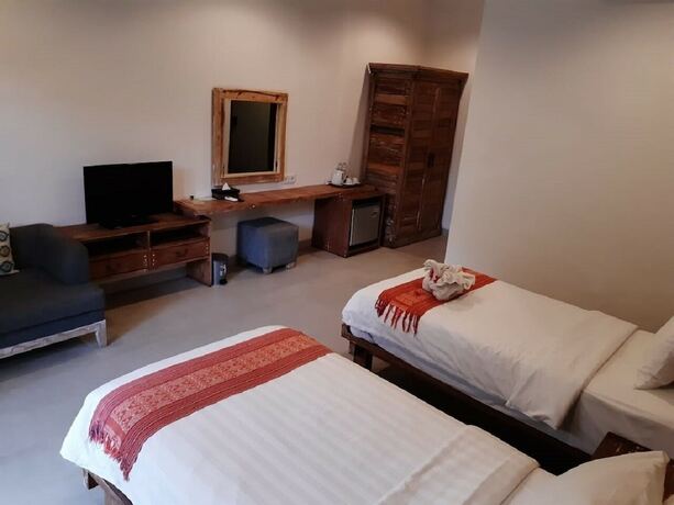 Imagen de la habitación del Hotel Mina Pelasa and Resto. Foto 11