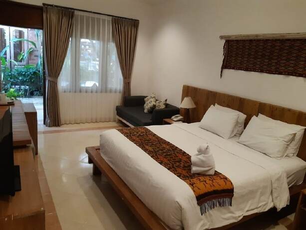 Imagen de la habitación del Hotel Mina Pelasa and Resto. Foto 16