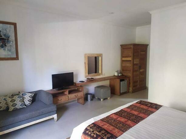 Imagen de la habitación del Hotel Mina Pelasa and Resto. Foto 18