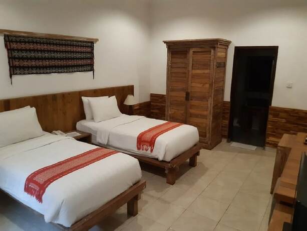 Imagen de la habitación del Hotel Mina Pelasa and Resto. Foto 20