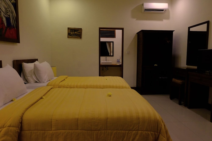 Imagen de la habitación del Hotel Mina Tanjung. Foto 8