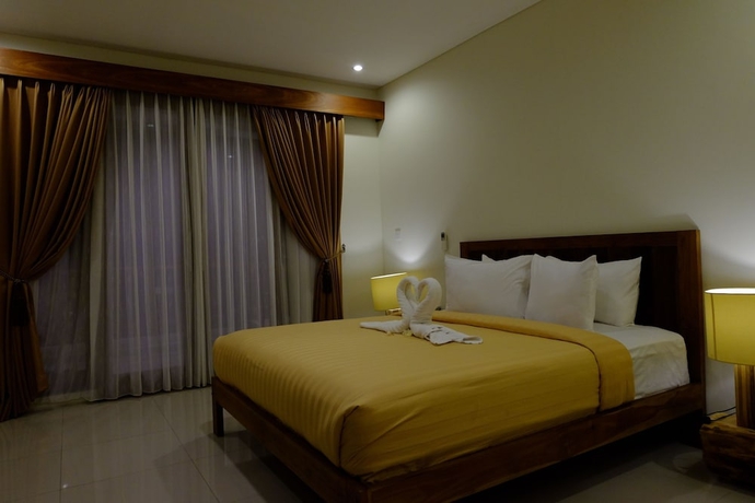 Imagen de la habitación del Hotel Mina Tanjung. Foto 9