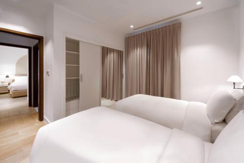 Imagen de la habitación del Hotel Mina and Residences By The Torch. Foto 18