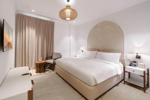 Imagen de la habitación del Hotel Mina and Residences By The Torch. Foto 20