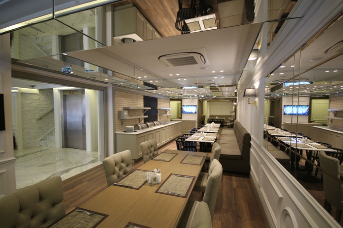 Imagen del bar/restaurante del Hotel Mina – Special Class. Foto 2