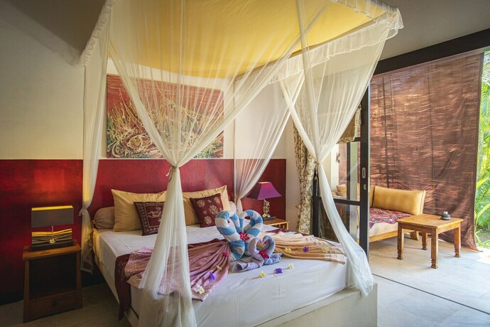 Imagen de la habitación del Hotel Minabali Bunga'lo. Foto 30