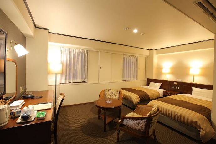 Imagen de la habitación del Hotel Minakuchi Century. Foto 11