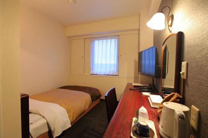 Imagen de la habitación del Hotel Minakuchi Century. Foto 12