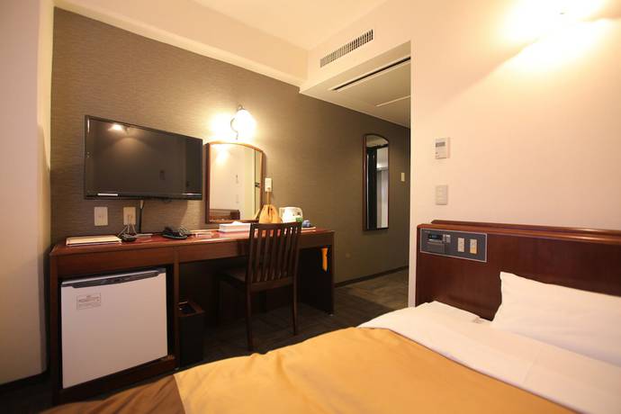 Imagen de la habitación del Hotel Minakuchi Century. Foto 13