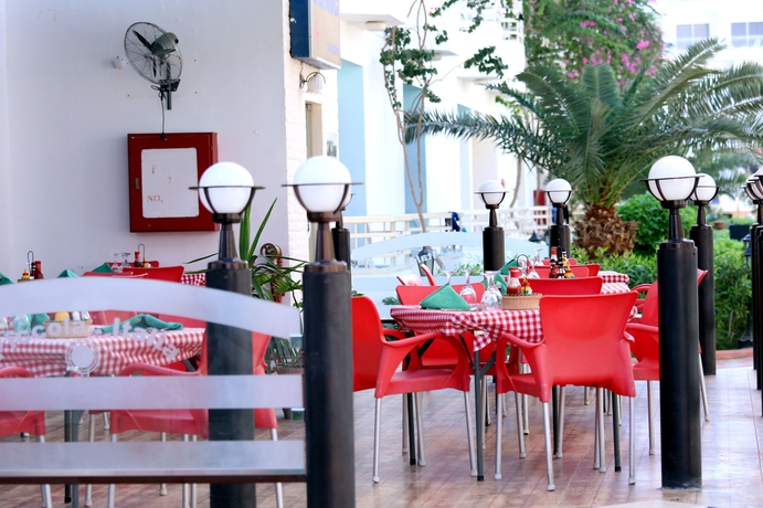 Imagen del bar/restaurante del Hotel Minamark Resort and Spa, For Families and Couples Only. Foto 8