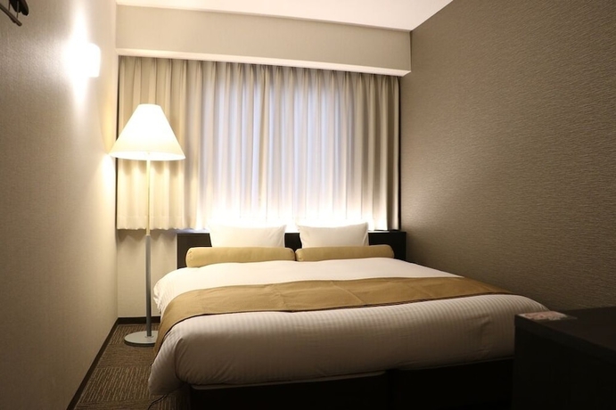 Imagen de la habitación del Hotel Minamisenri Crystal. Foto 11