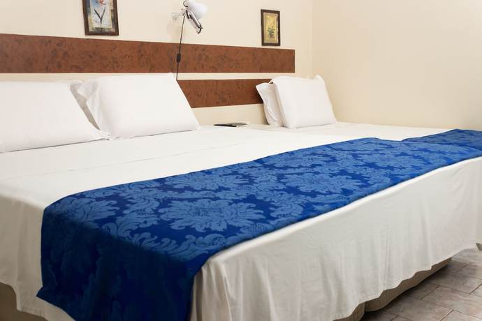 Imagen de la habitación del Hotel Minastur. Foto 12