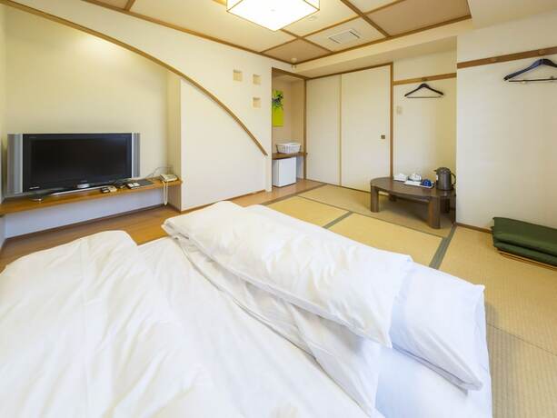 Imagen de la habitación del Hotel Minatoya. Foto 14