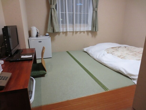 Imagen de la habitación del Hotel Minatoya. Foto 20