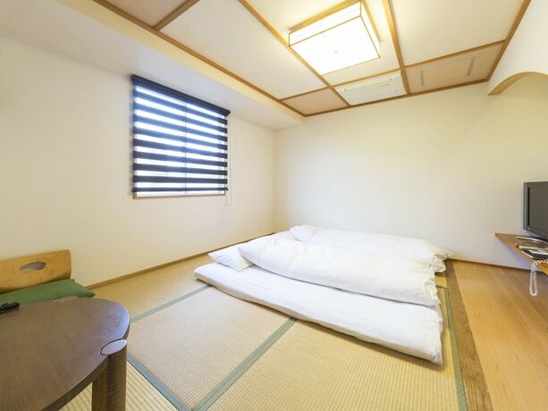 Imagen de la habitación del Hotel Minatoya. Foto 23
