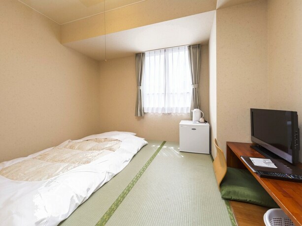 Imagen de la habitación del Hotel Minatoya. Foto 27