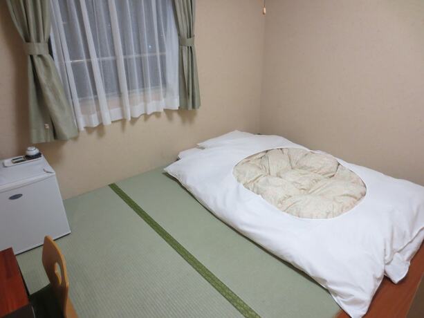 Imagen de la habitación del Hotel Minatoya. Foto 28