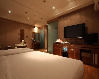 Imagen de la habitación del Hotel Mind Tourist Hotel. Foto 8