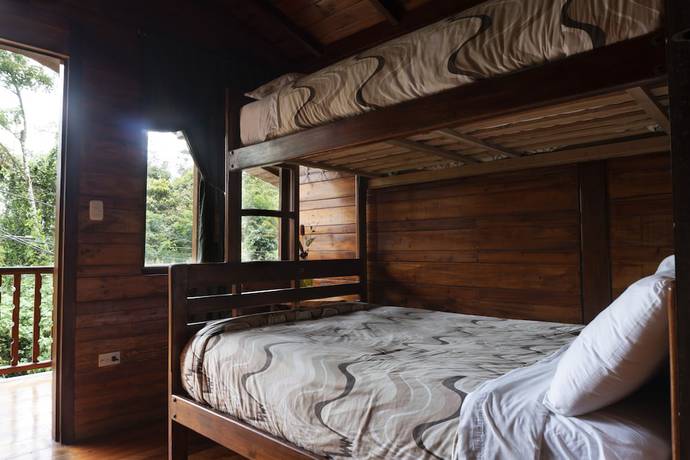 Imagen de la habitación del Hotel Mindo Green House. Foto 5