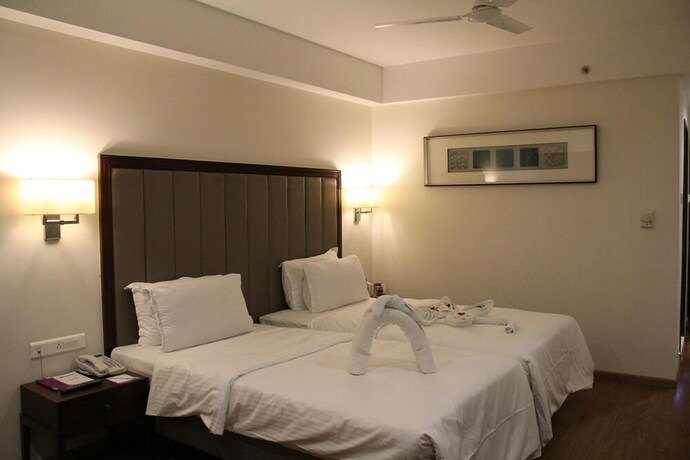 Imagen de la habitación del Hotel Minerva Grand. Foto 25