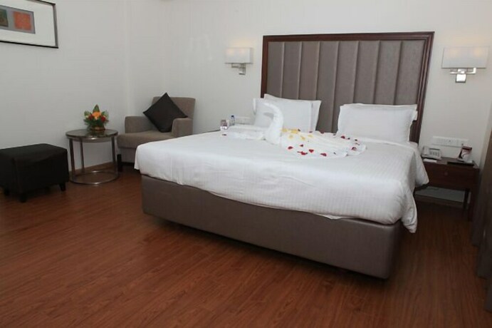 Imagen de la habitación del Hotel Minerva Grand. Foto 26