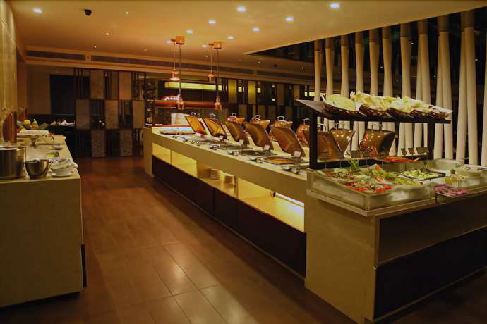 Imagen del bar/restaurante del Hotel Minerva Grand Kondapur. Foto 2