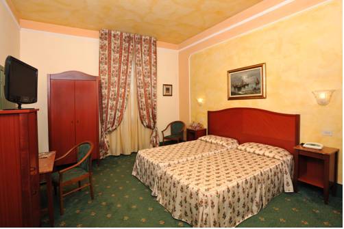 Imagen de la habitación del Hotel Minerva Palace. Foto 11