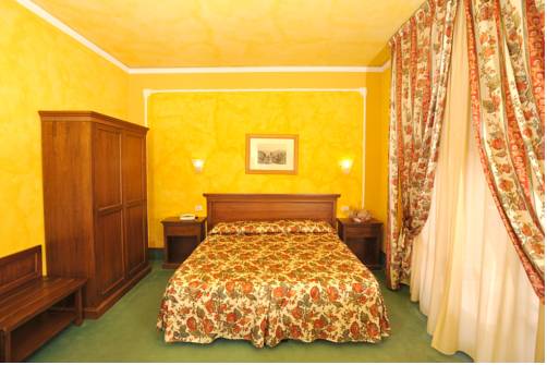 Imagen de la habitación del Hotel Minerva Palace. Foto 13