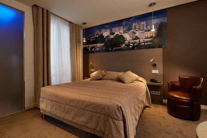 Imagen de la habitación del Hotel Minerve Paris. Foto 2