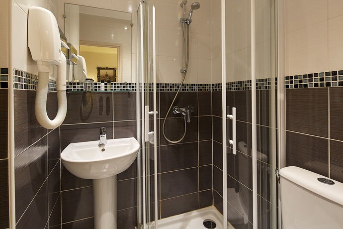 Imagen de la habitación del Hotel Minerve Paris. Foto 3