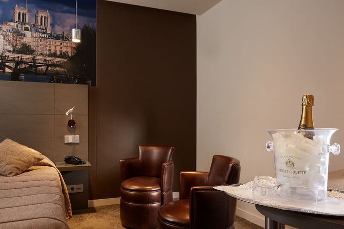 Imagen de la habitación del Hotel Minerve Paris. Foto 12