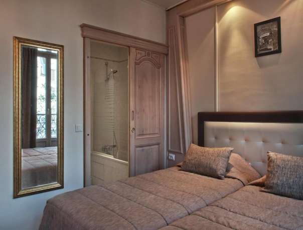 Imagen de la habitación del Hotel Minerve Paris. Foto 15