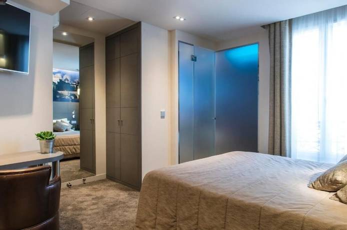 Imagen de la habitación del Hotel Minerve Paris. Foto 16