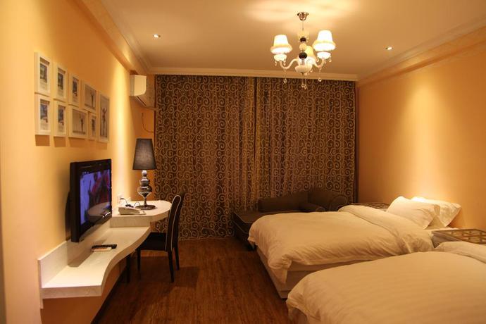 Imagen de la habitación del Hotel Ming Cheng. Foto 2