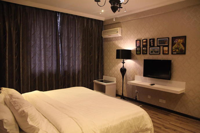 Imagen de la habitación del Hotel Ming Cheng. Foto 7