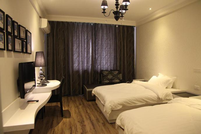 Imagen de la habitación del Hotel Ming Cheng. Foto 8